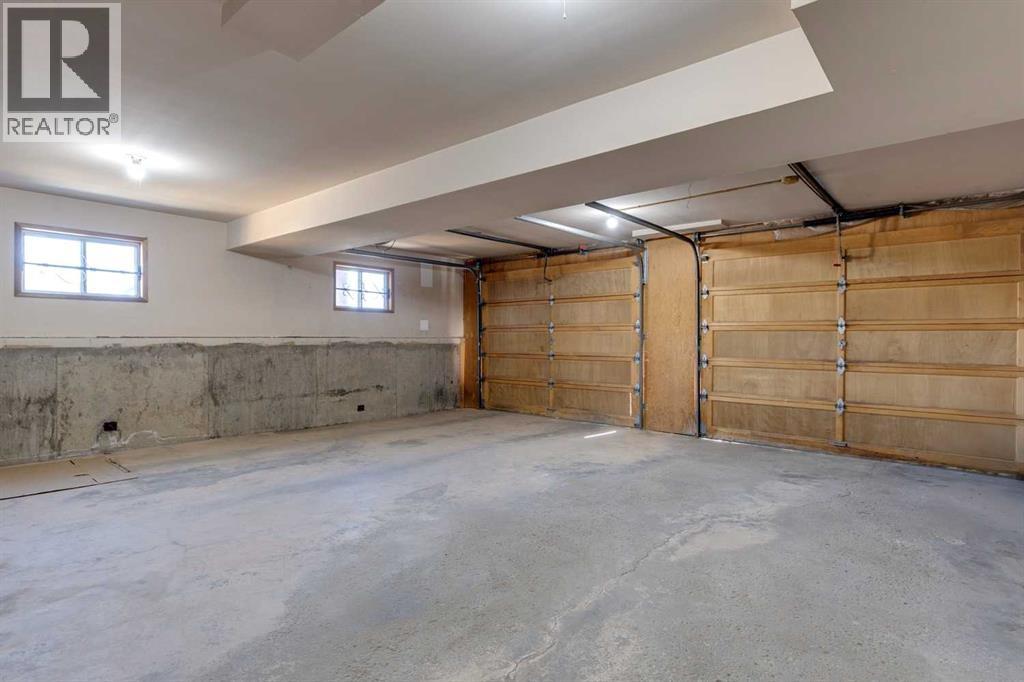 80 Beacham Rise Nw, Calgary, Alberta  T3K 1S2 - Photo 42 - A2266688