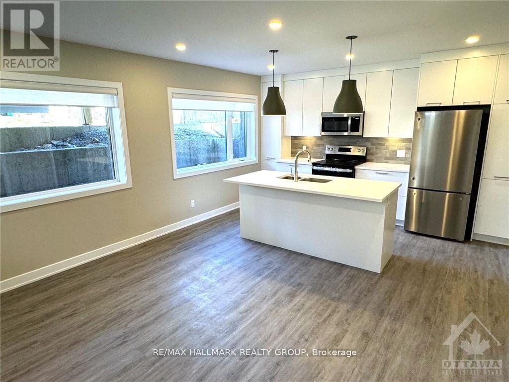 B - 314 Mona Avenue, Ottawa, Ontario  K1L 7A2 - Photo 4 - X12488878