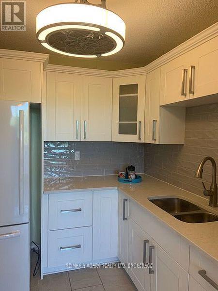 609 - 365 Geneva St Street, St. Catharines, Ontario  L2N 5S7 - Photo 18 - X12488104