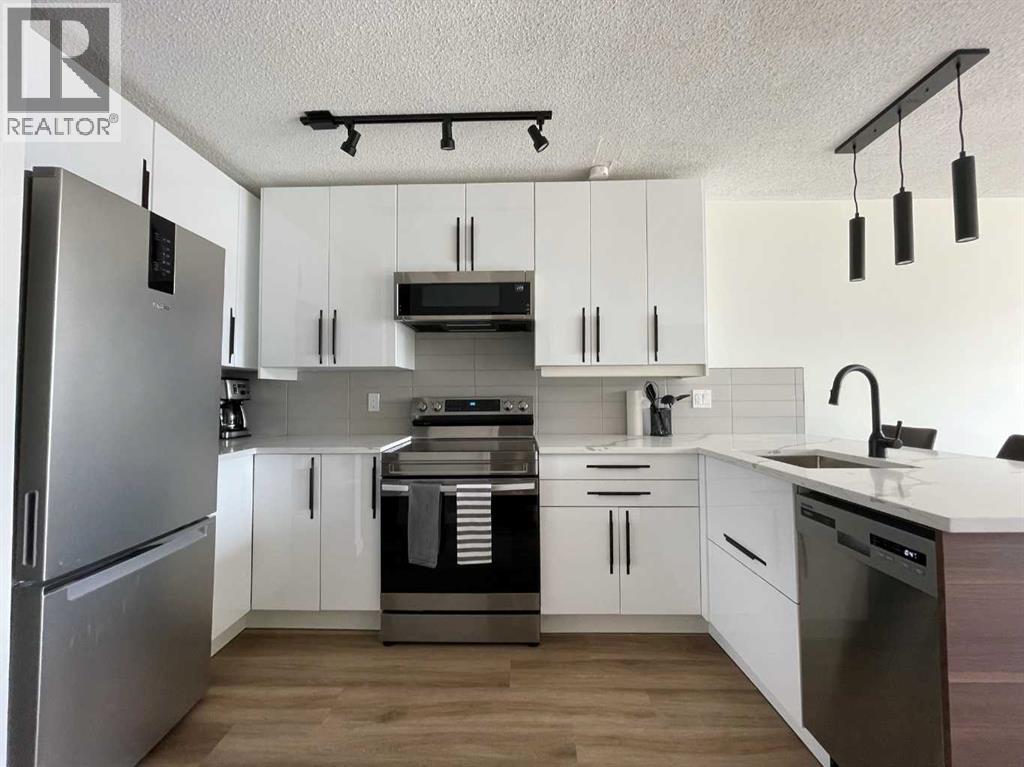 703, 340 14 Avenue Sw, Calgary, Alberta  T2R 0M4 - Photo 2 - A2254720