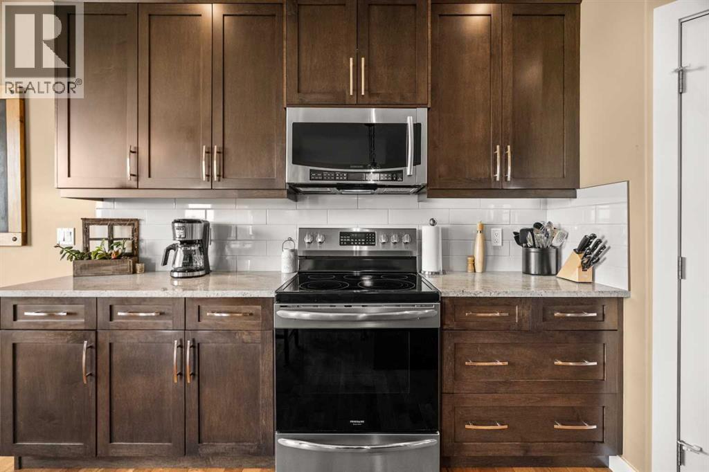 653 West Highland Crescent, Carstairs, Alberta  T0M 0N0 - Photo 18 - A2239470