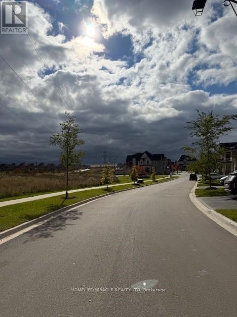 81 Morning Sparrow Drive, Vaughan, Ontario  L4L 3N5 - Photo 2 - N12488816