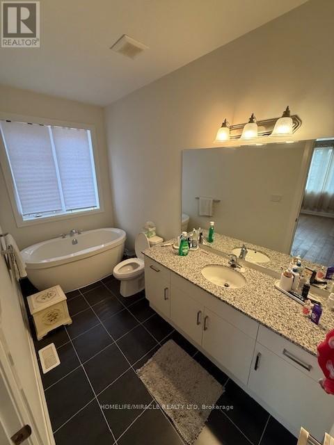 81 Morning Sparrow Drive, Vaughan, Ontario  L4L 3N5 - Photo 25 - N12488816