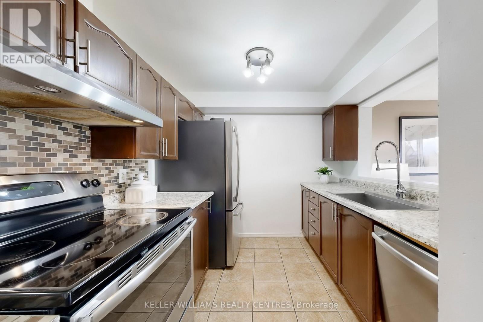 69 Goodwin Drive, Barrie (Painswick South), Ontario  L4N 5Z8 - Photo 7 - S12488794