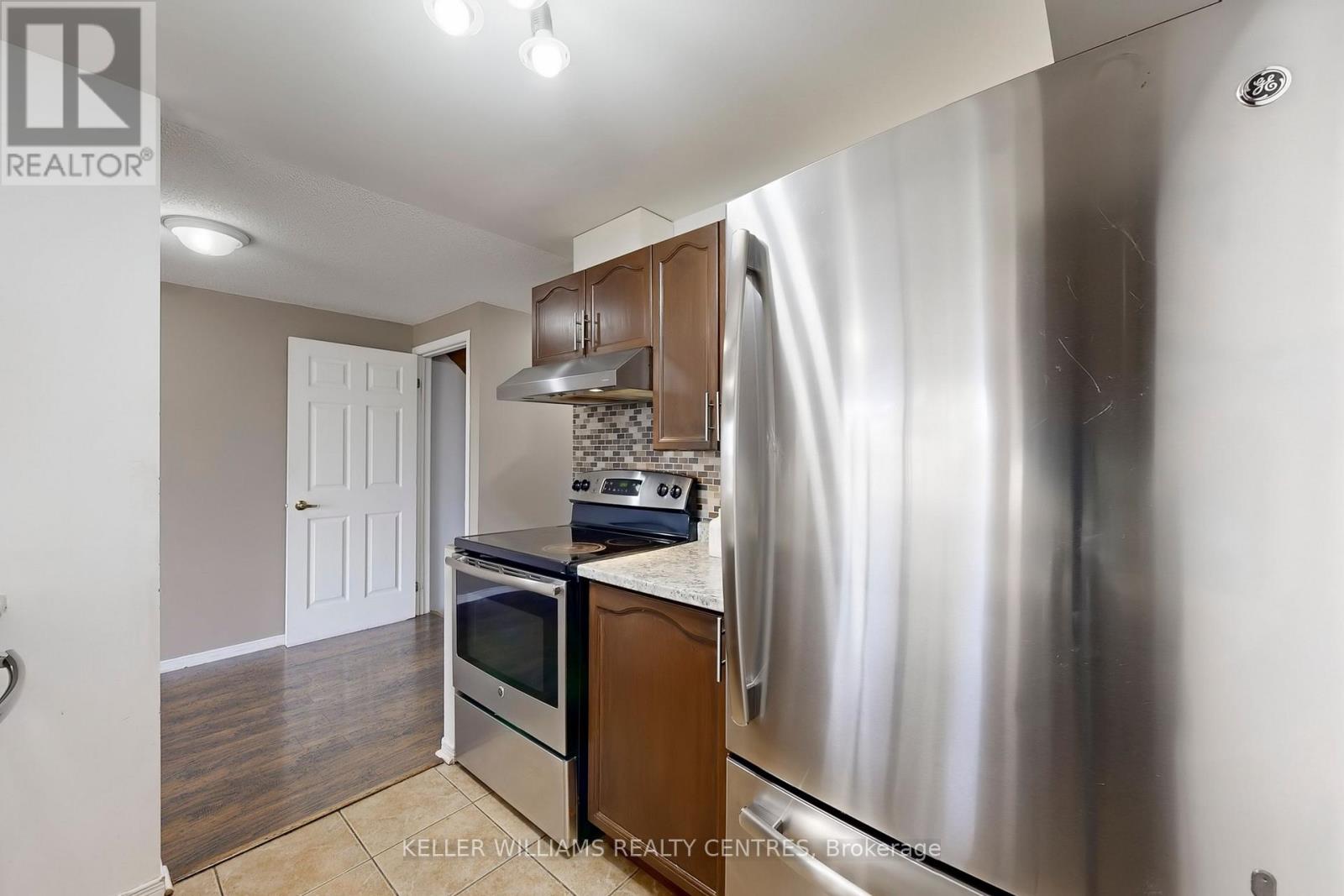 69 Goodwin Drive, Barrie (Painswick South), Ontario  L4N 5Z8 - Photo 8 - S12488794