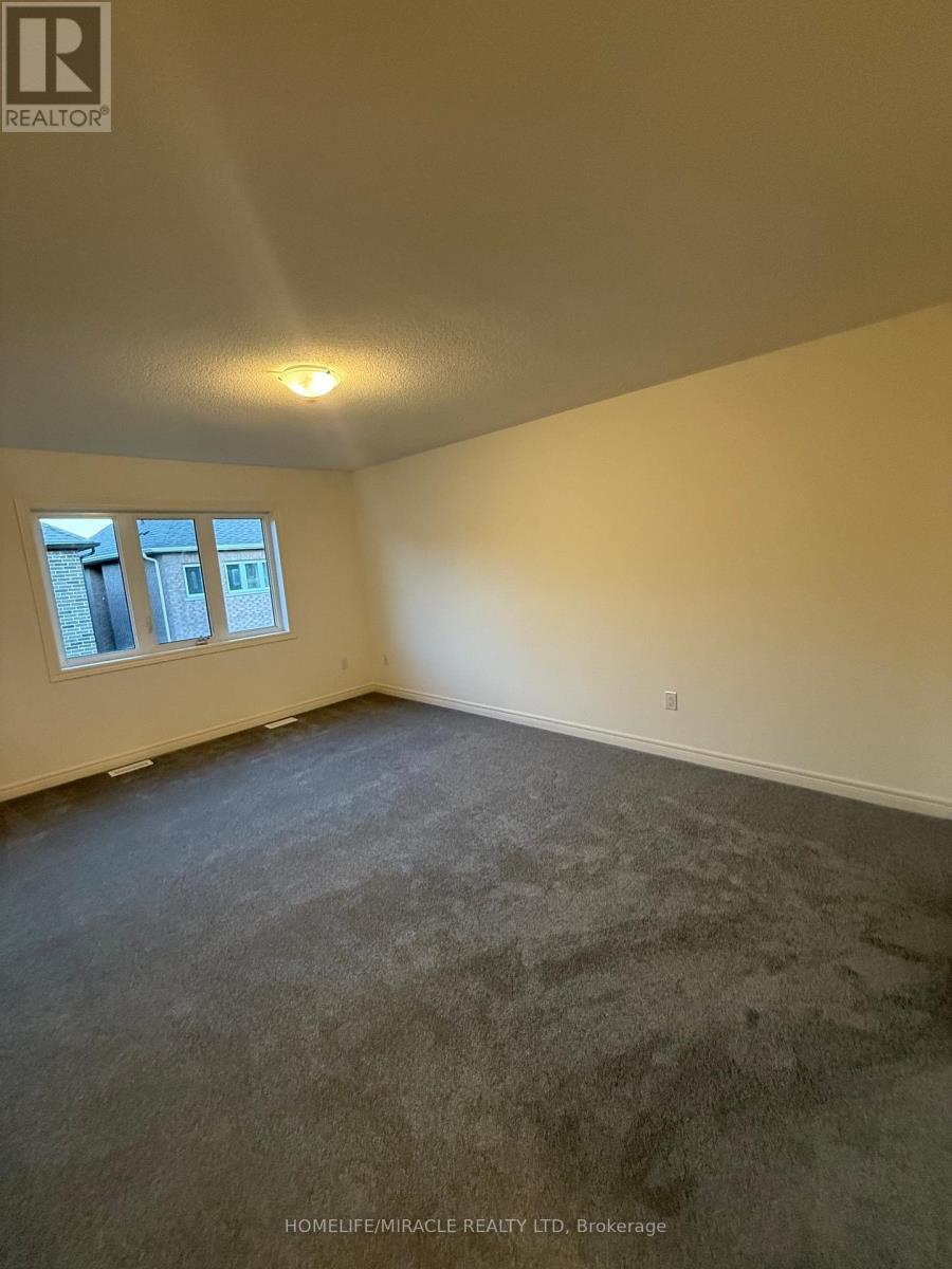 16 Bushwood Trail, Brampton, Ontario  L7A 5J7 - Photo 13 - W12487834