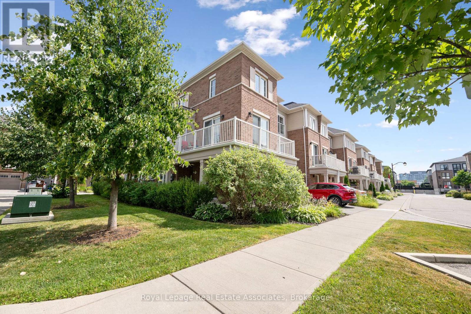 71 - 165 Hampshire Way, Milton, Ontario  L9T 8M7 - Photo 2 - W12488108