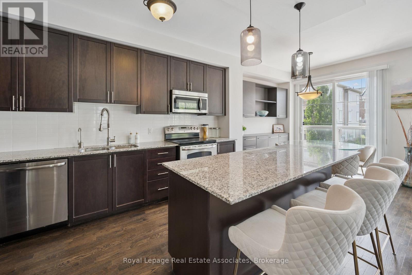 71 - 165 Hampshire Way, Milton, Ontario  L9T 8M7 - Photo 7 - W12488108