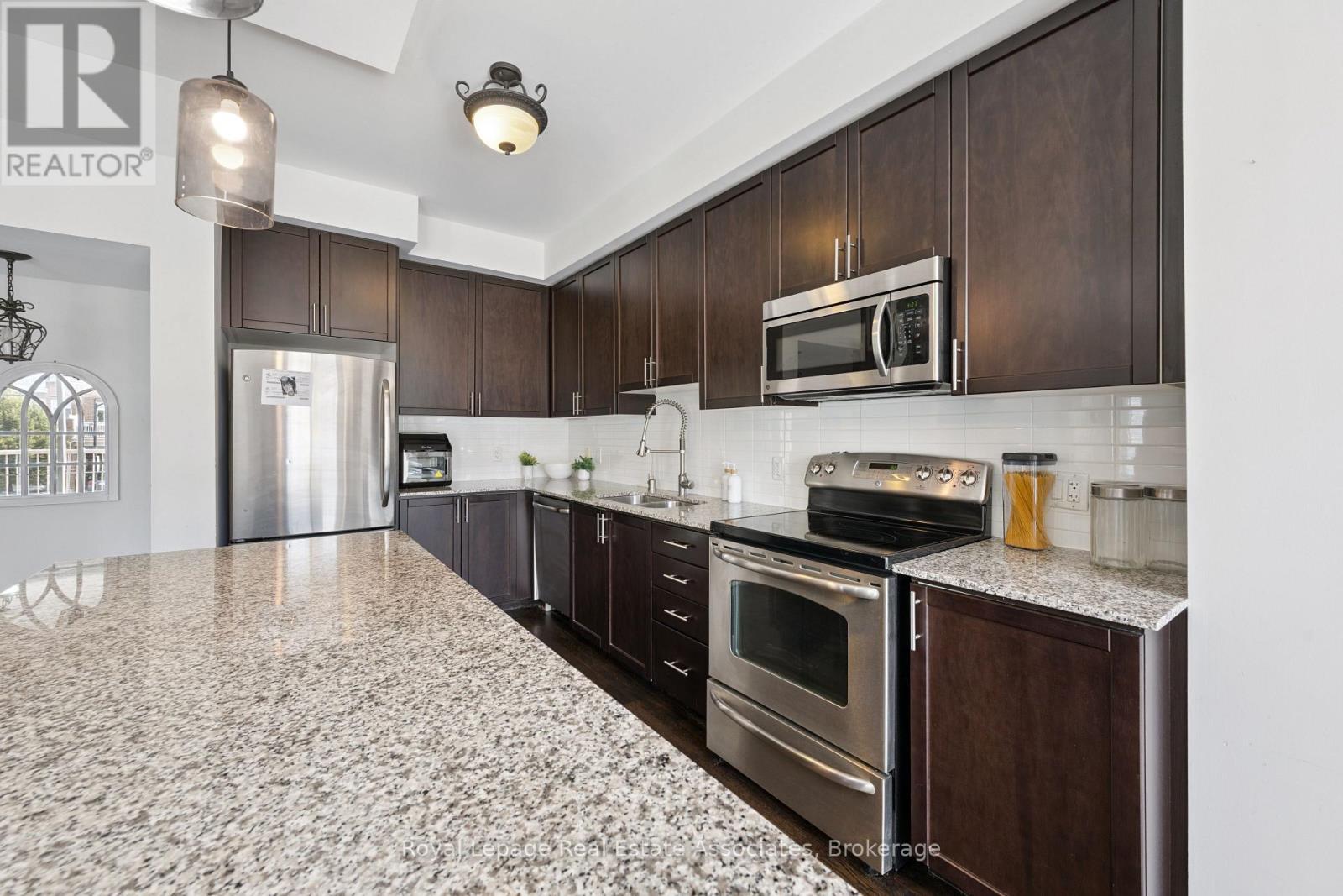 71 - 165 Hampshire Way, Milton, Ontario  L9T 8M7 - Photo 9 - W12488108