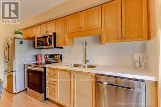 8 - 37 Four Winds Drive, Toronto, Ontario  M3J 1K7 - Photo 11 - W12488212