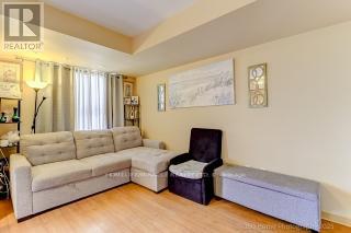 8 - 37 Four Winds Drive, Toronto, Ontario  M3J 1K7 - Photo 5 - W12488212