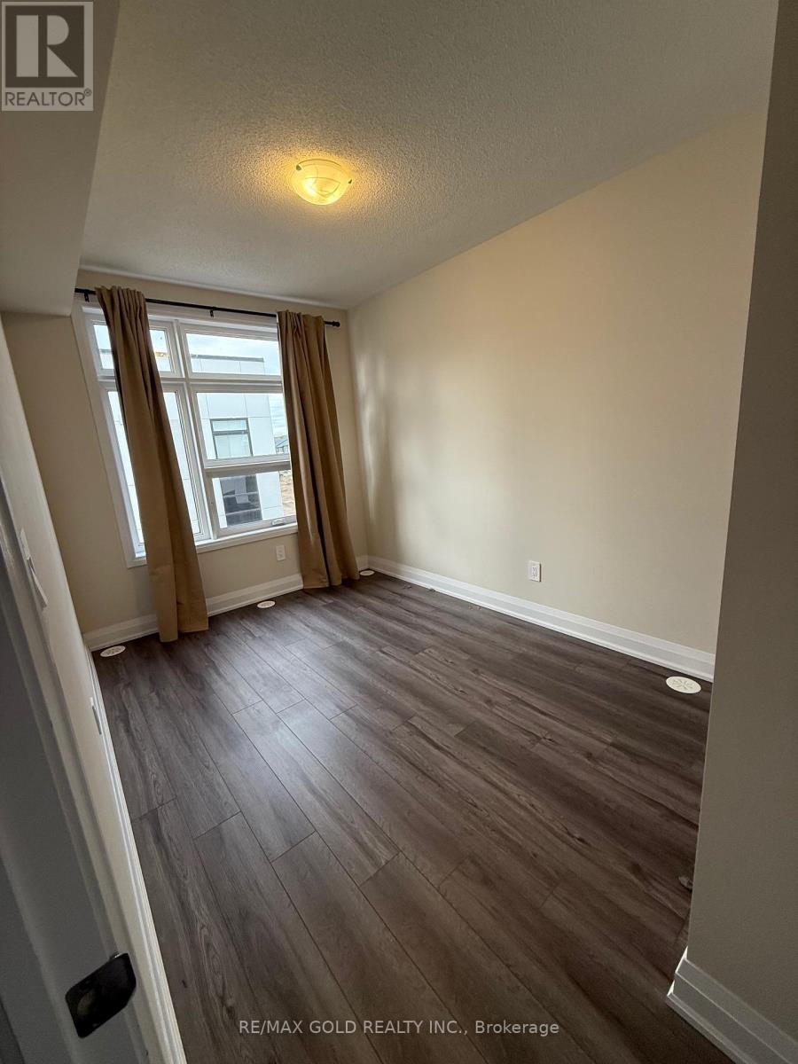 105 - 1581 Rose Way, Milton, Ontario  L9T 7E7 - Photo 2 - W12488420