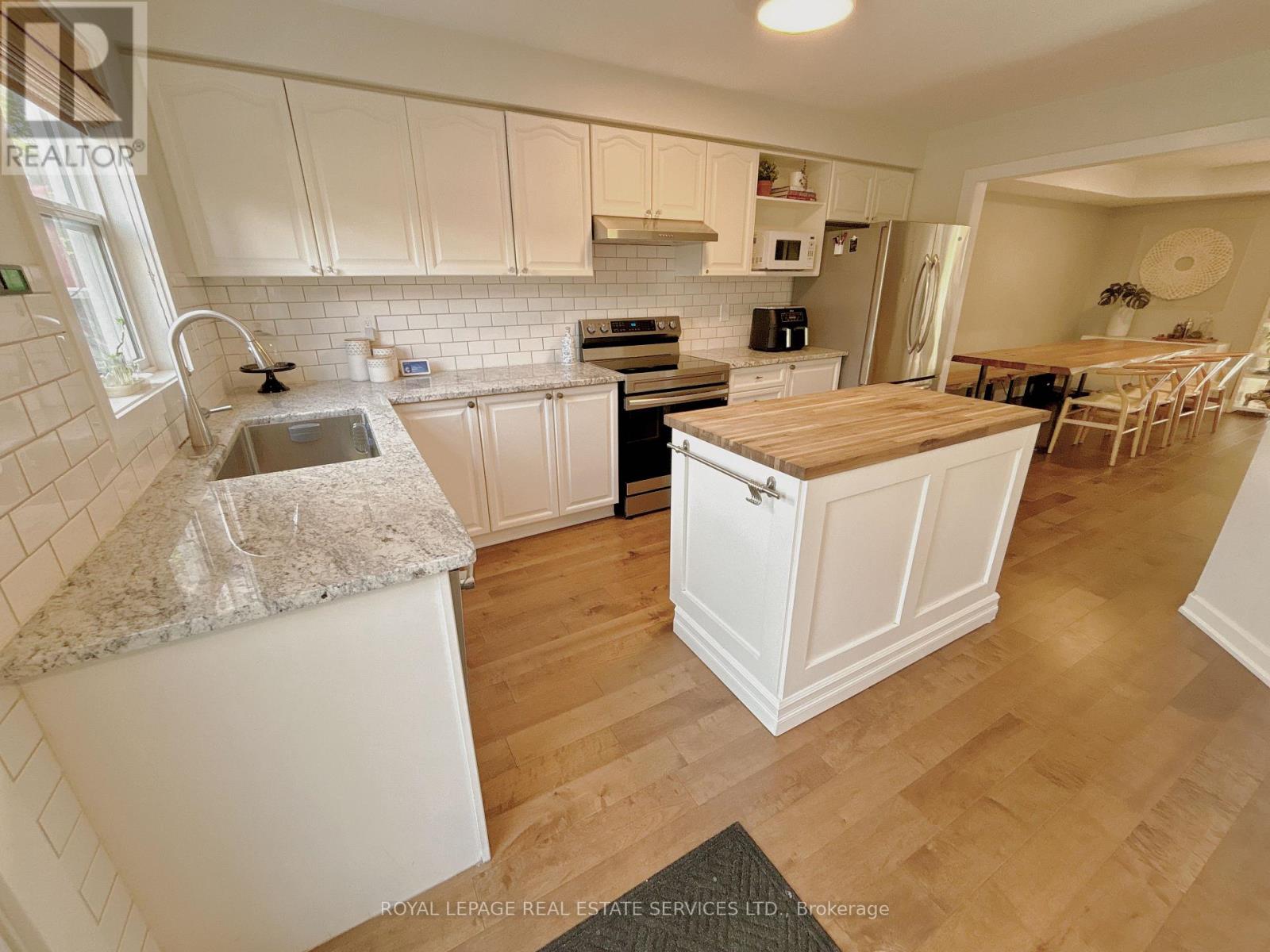 225 Gatwick Drive, Oakville, Ontario  L6H 6T6 - Photo 6 - W12488832