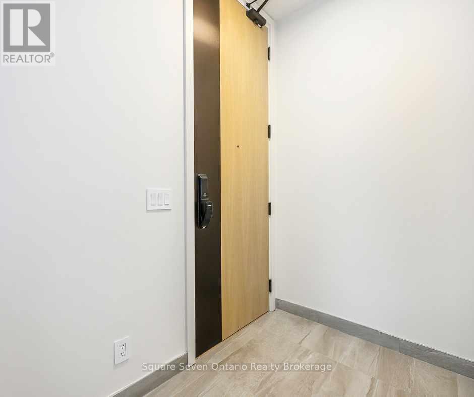 412 - 123 Maurice Drive, Oakville, Ontario  L6K 2W6 - Photo 2 - W12488948