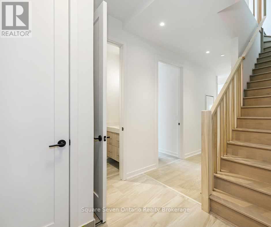 412 - 123 Maurice Drive, Oakville, Ontario  L6K 2W6 - Photo 3 - W12488948