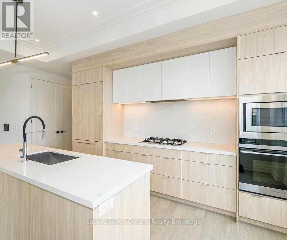 412 - 123 Maurice Drive, Oakville, Ontario  L6K 2W6 - Photo 5 - W12488948