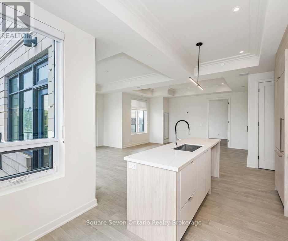 412 - 123 Maurice Drive, Oakville, Ontario  L6K 2W6 - Photo 6 - W12488948