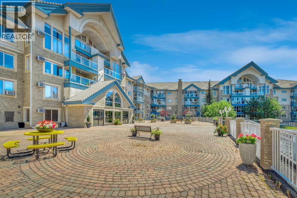 204, 7239 Sierra Morena Boulevard Sw, Calgary, Alberta  T3H 3L7 - Photo 1 - A2263850