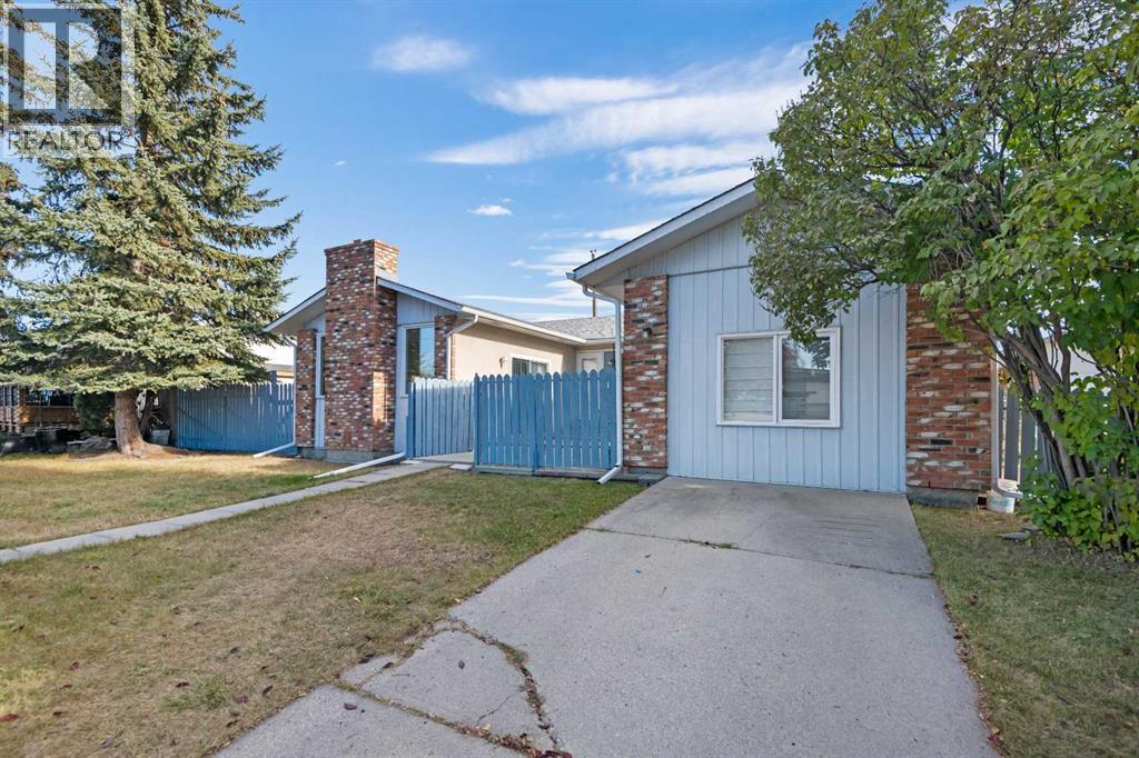 228 Queensland Drive Se, Calgary, Alberta  T2J 3R8 - Photo 2 - A2266895
