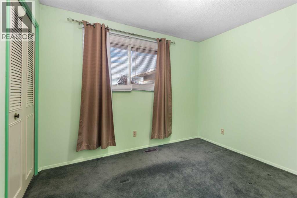 228 Queensland Drive Se, Calgary, Alberta  T2J 3R8 - Photo 25 - A2266895