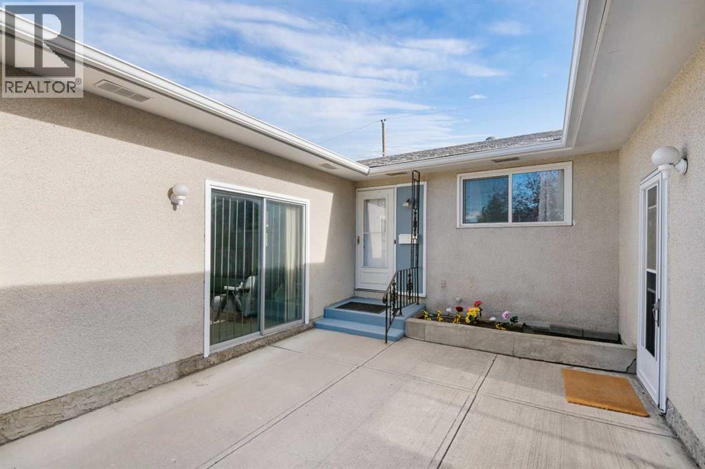 228 Queensland Drive Se, Calgary, Alberta  T2J 3R8 - Photo 5 - A2266895