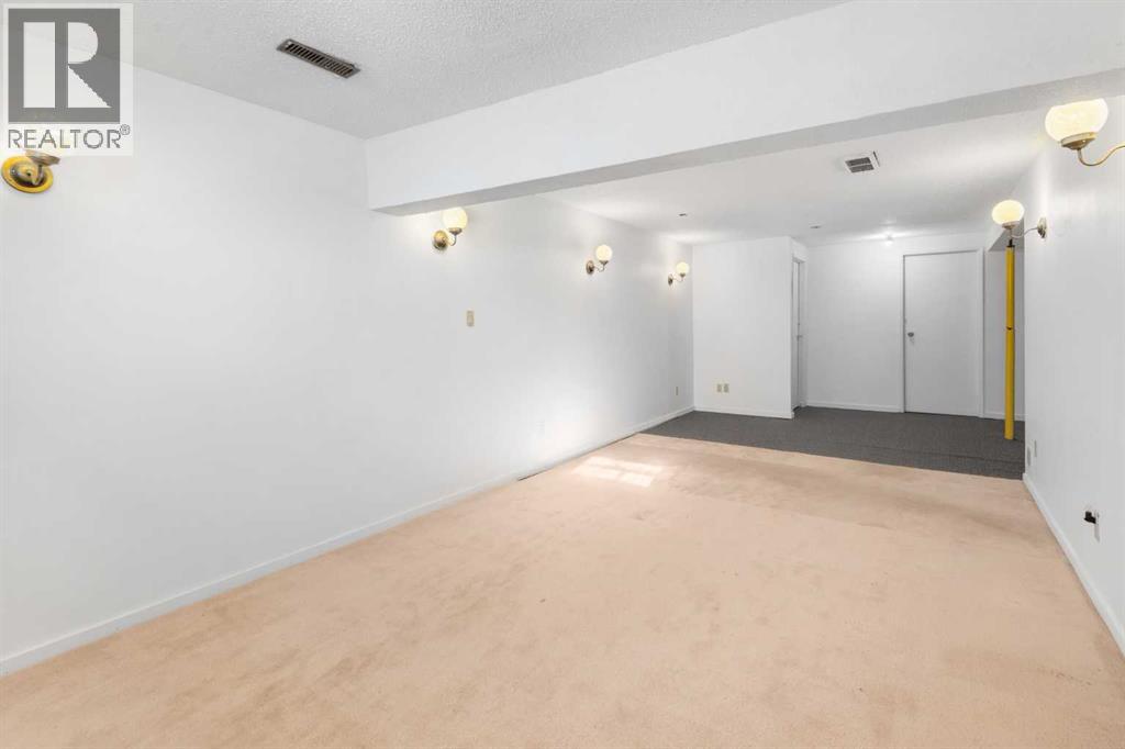 228 Queensland Drive Se, Calgary, Alberta  T2J 3R8 - Photo 30 - A2266895