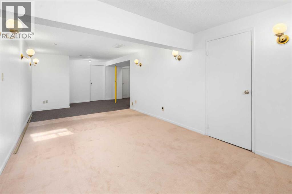 228 Queensland Drive Se, Calgary, Alberta  T2J 3R8 - Photo 31 - A2266895