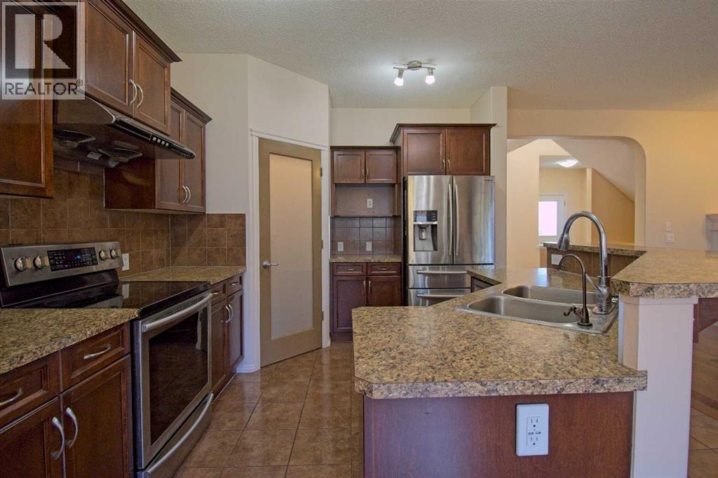 109 Bridlerange Place Sw, Calgary, Alberta  T2Y 0K8 - Photo 12 - A2254555