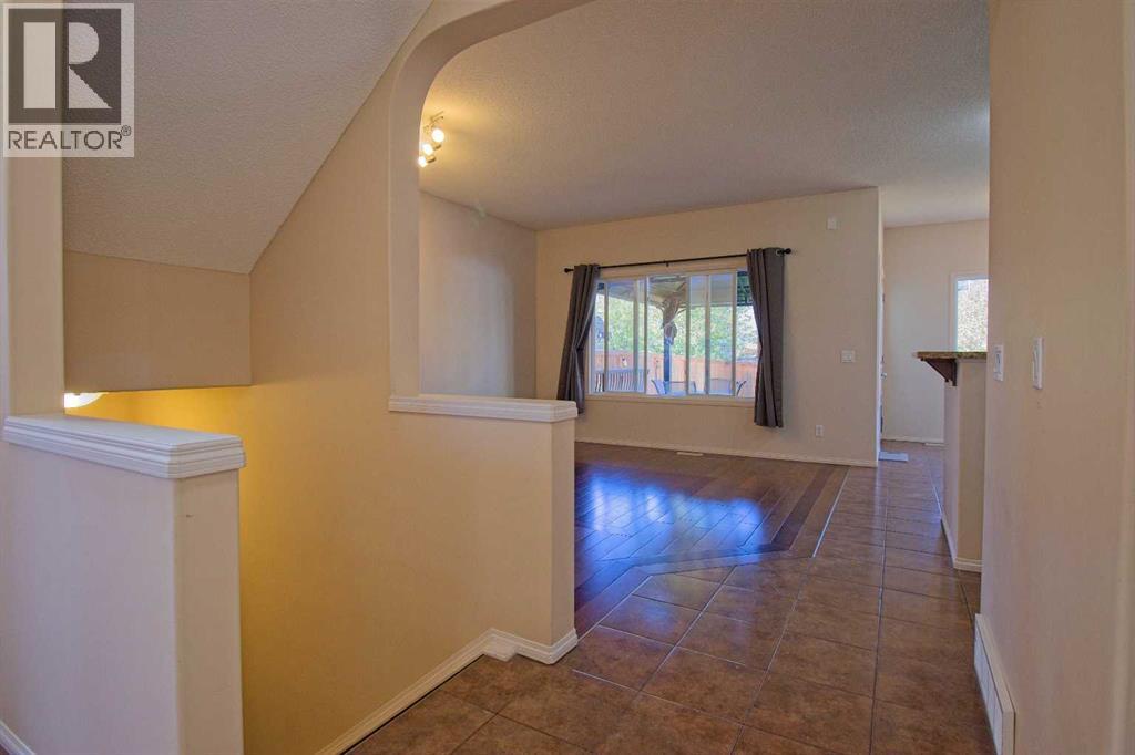 109 Bridlerange Place Sw, Calgary, Alberta  T2Y 0K8 - Photo 5 - A2254555