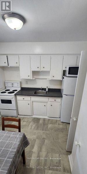 114 Seventh Street, Toronto, Ontario  M8V 3B4 - Photo 2 - W12489502