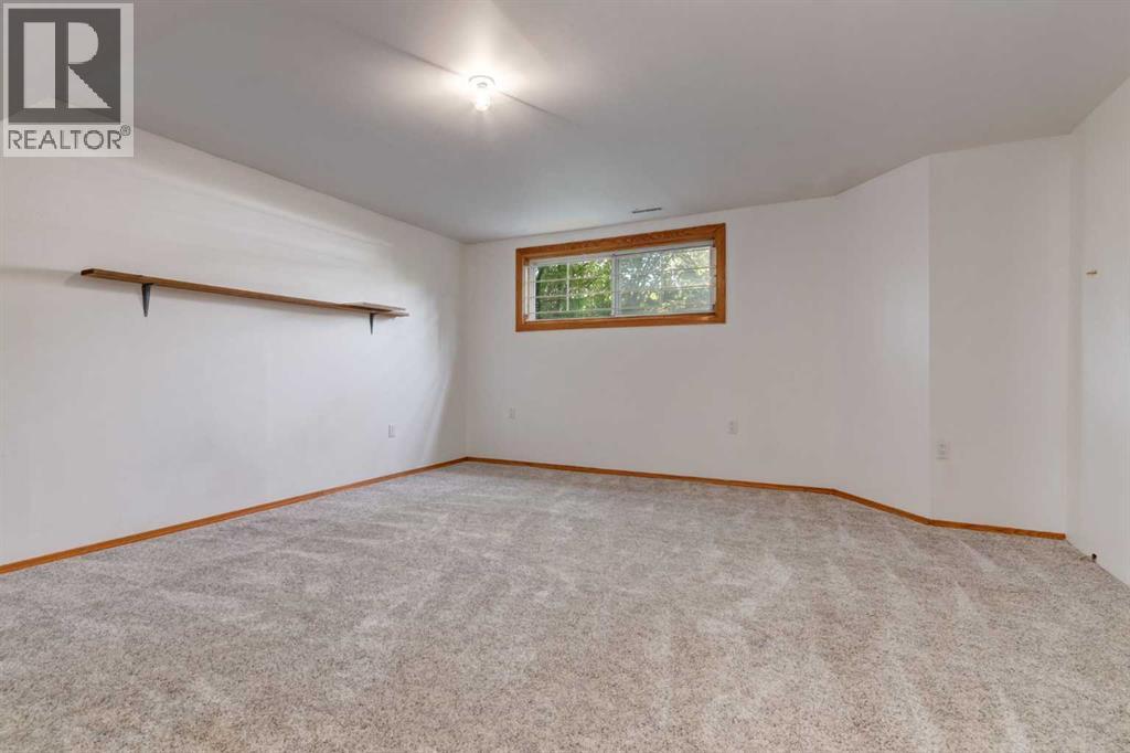 6707 Bow Crescent Nw, Calgary, Alberta  T3B 2C8 - Photo 26 - A2240710