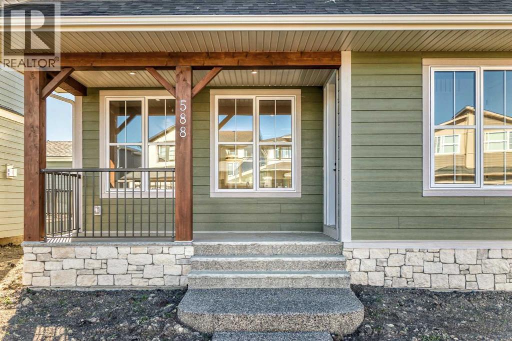 588 Grayling Bend, Rural Rocky View County, Alberta  T3Z 0H4 - Photo 3 - A2264134