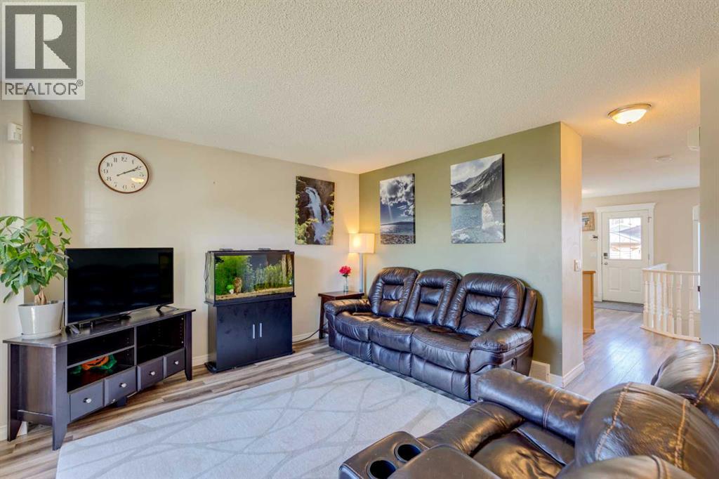 85 Crystal Shores Crescent, Okotoks, Alberta  T1S 2B5 - Photo 3 - A2266485
