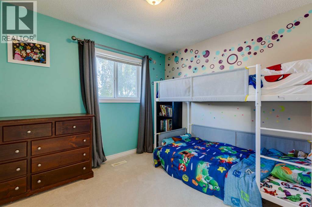 85 Crystal Shores Crescent, Okotoks, Alberta  T1S 2B5 - Photo 17 - A2266485