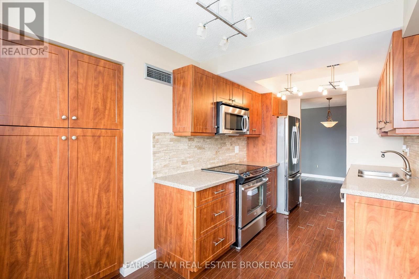 1510 - 100 County Court Boulevard, Brampton, Ontario  L6W 3X1 - Photo 9 - W12490398