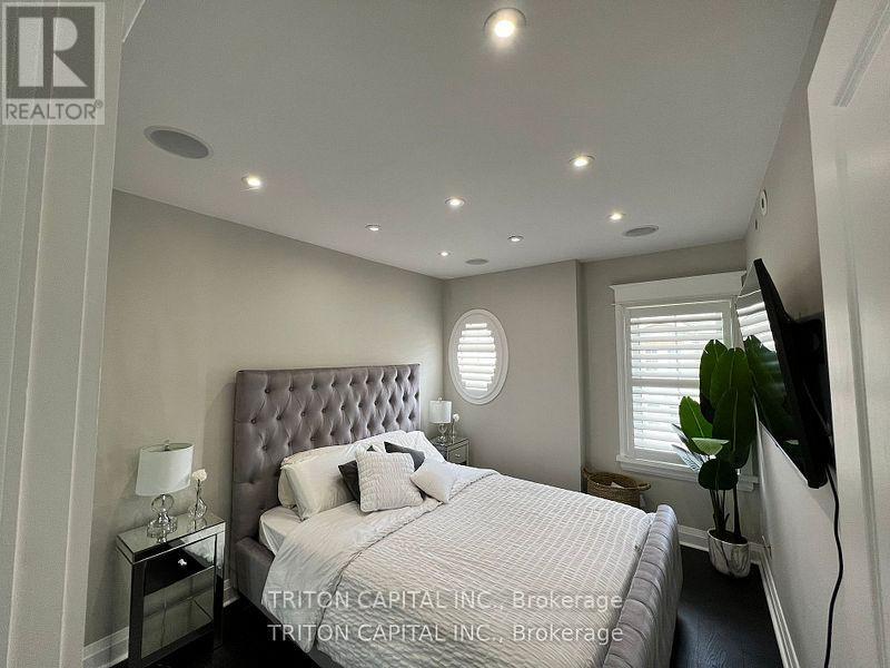 Th99 - 9 Windermere Avenue, Toronto, Ontario  M6S 5A4 - Photo 5 - W12490594