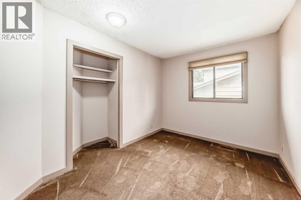 246 Berwick Drive Nw, Calgary, Alberta  T3K 1P5 - Photo 10 - A2254102