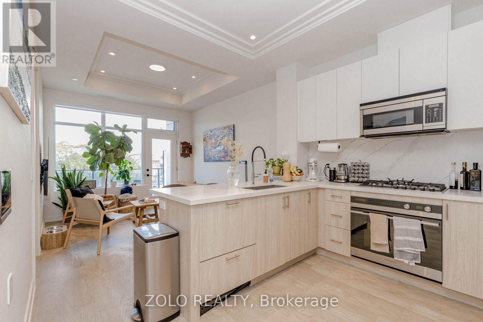 208 - 123 Maurice Drive, Oakville, Ontario  L6K 2W6 - Photo 10 - W12490940