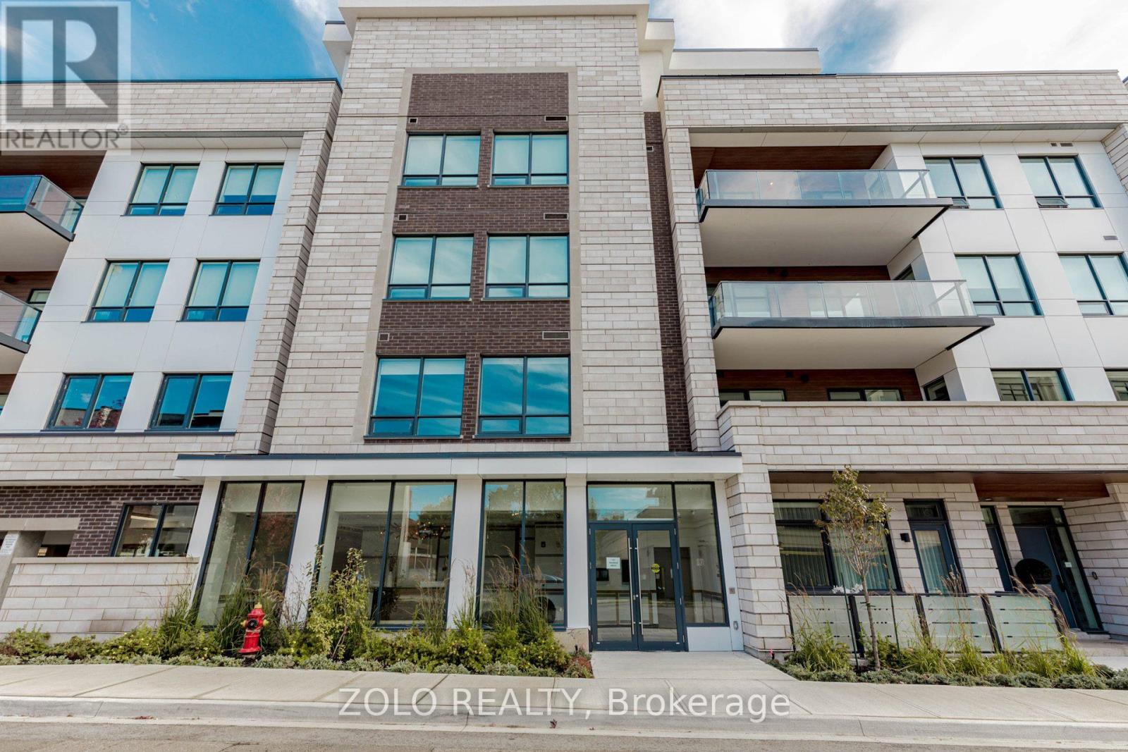 208 - 123 Maurice Drive, Oakville, Ontario  L6K 2W6 - Photo 2 - W12490940