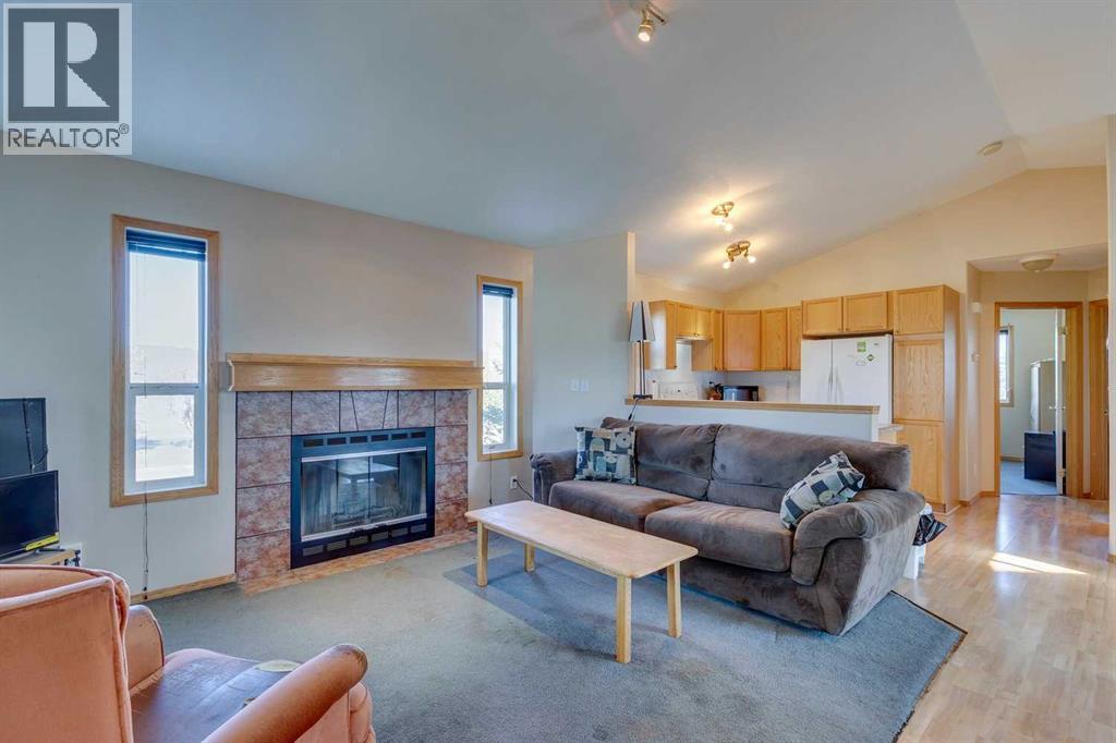 701 Sheep River Court, Okotoks, Alberta  T1S 1T8 - Photo 7 - A2263842