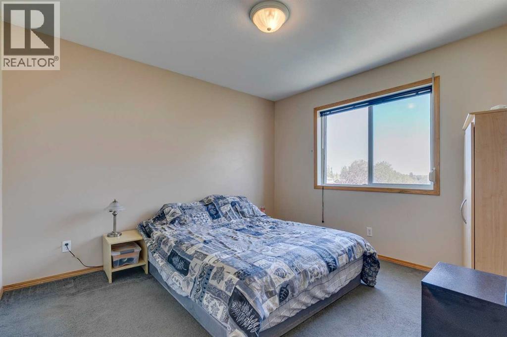 701 Sheep River Court, Okotoks, Alberta  T1S 1T8 - Photo 18 - A2263842