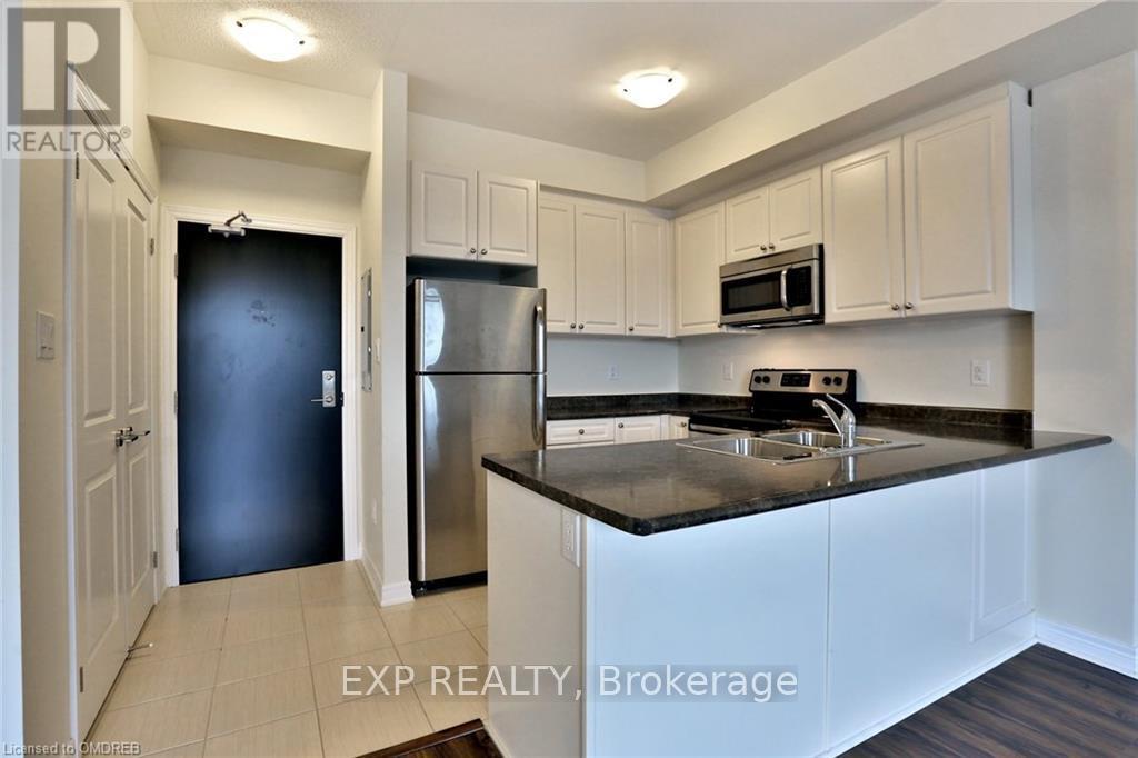 306 - 2339 Sawgrass Drive, Oakville, Ontario  L6H 7H9 - Photo 4 - W12491060