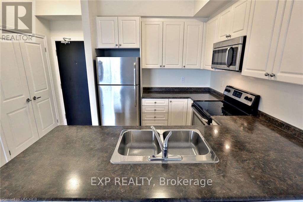 306 - 2339 Sawgrass Drive, Oakville, Ontario  L6H 7H9 - Photo 6 - W12491060