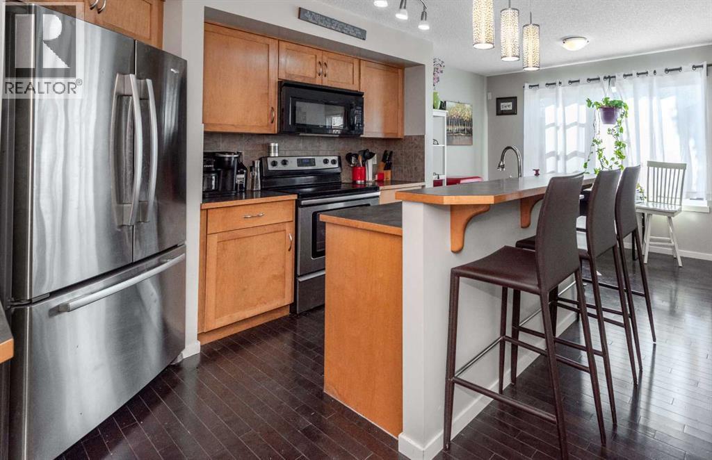 822 Panatella Boulevard Nw, Calgary, Alberta  T3K 0N7 - Photo 4 - A2259736