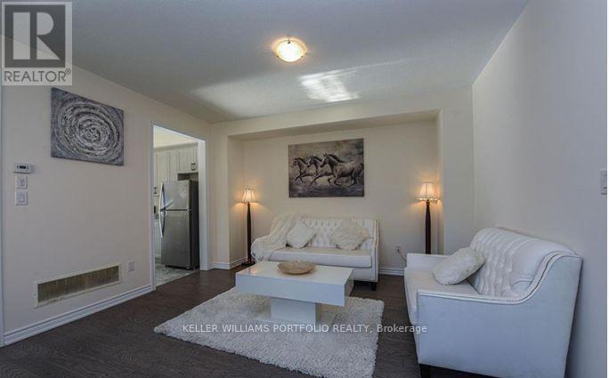 10 Hashmi Place, Brampton, Ontario  L6Y 6K1 - Photo 4 - W12491520