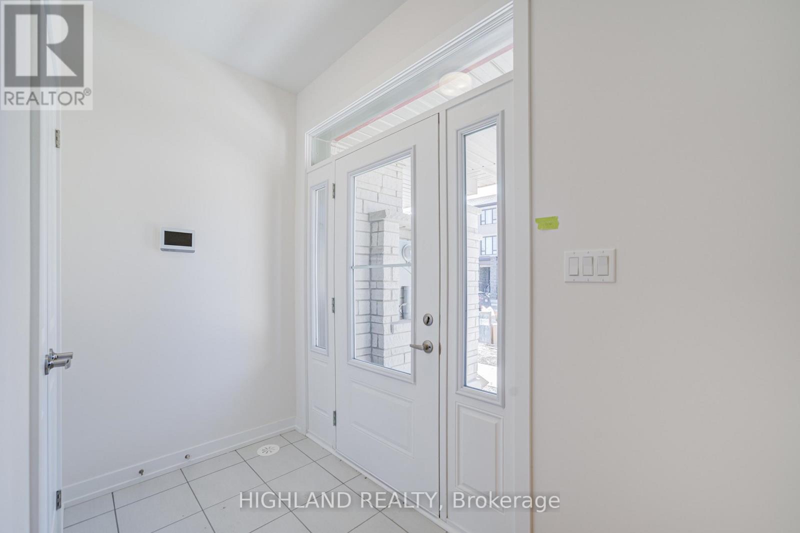 1118 Wheat Boom Drive, Oakville, Ontario  L6H 7W4 - Photo 3 - W12491692