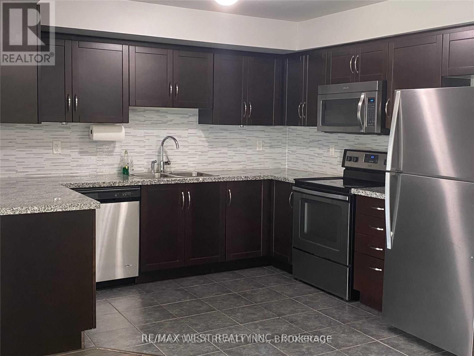 421 - 130 Widdicombe Hill Boulevard, Toronto, Ontario  M9R 4A6 - Photo 5 - W12491792