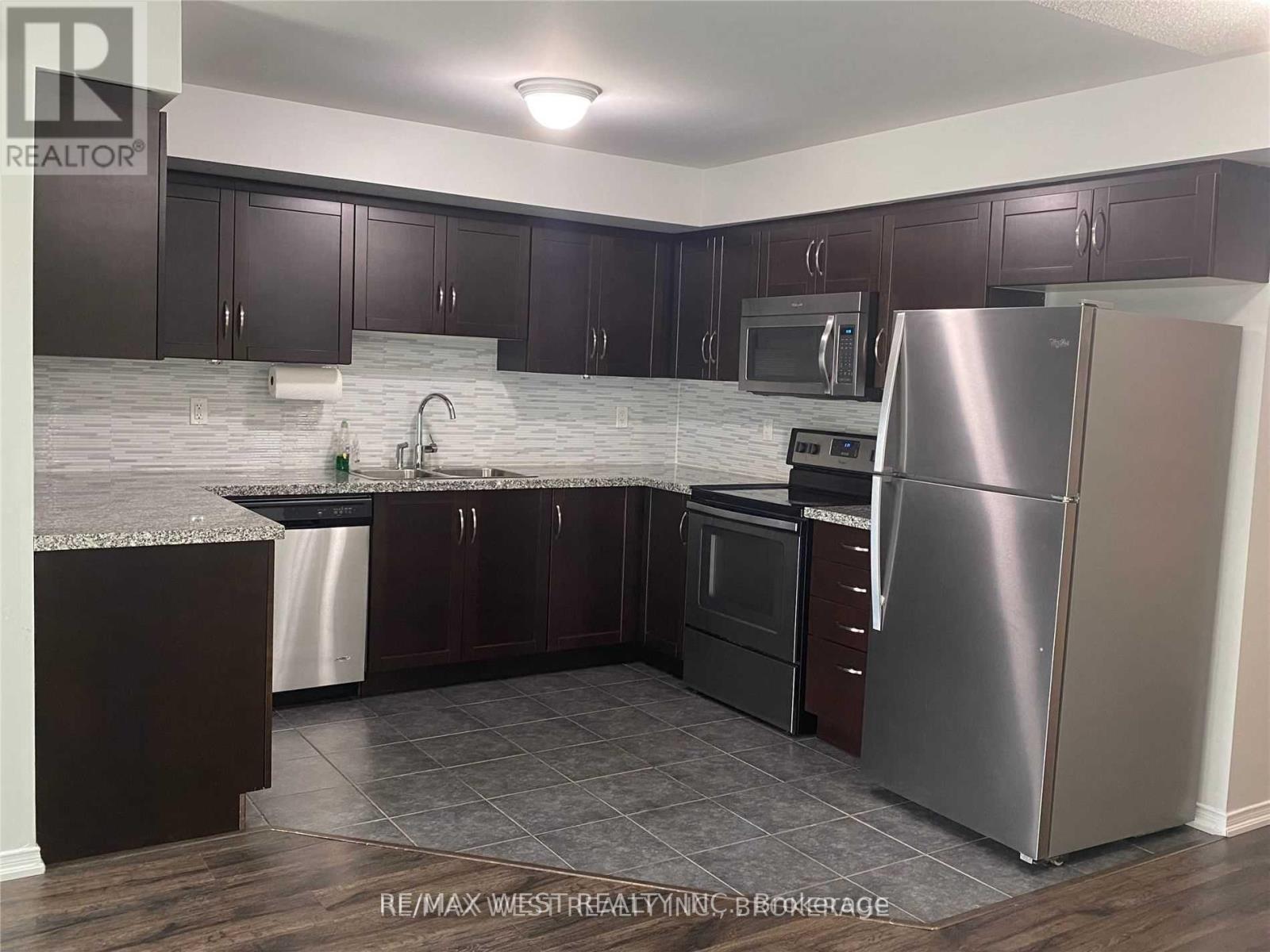 421 - 130 Widdicombe Hill Boulevard, Toronto, Ontario  M9R 4A6 - Photo 6 - W12491792