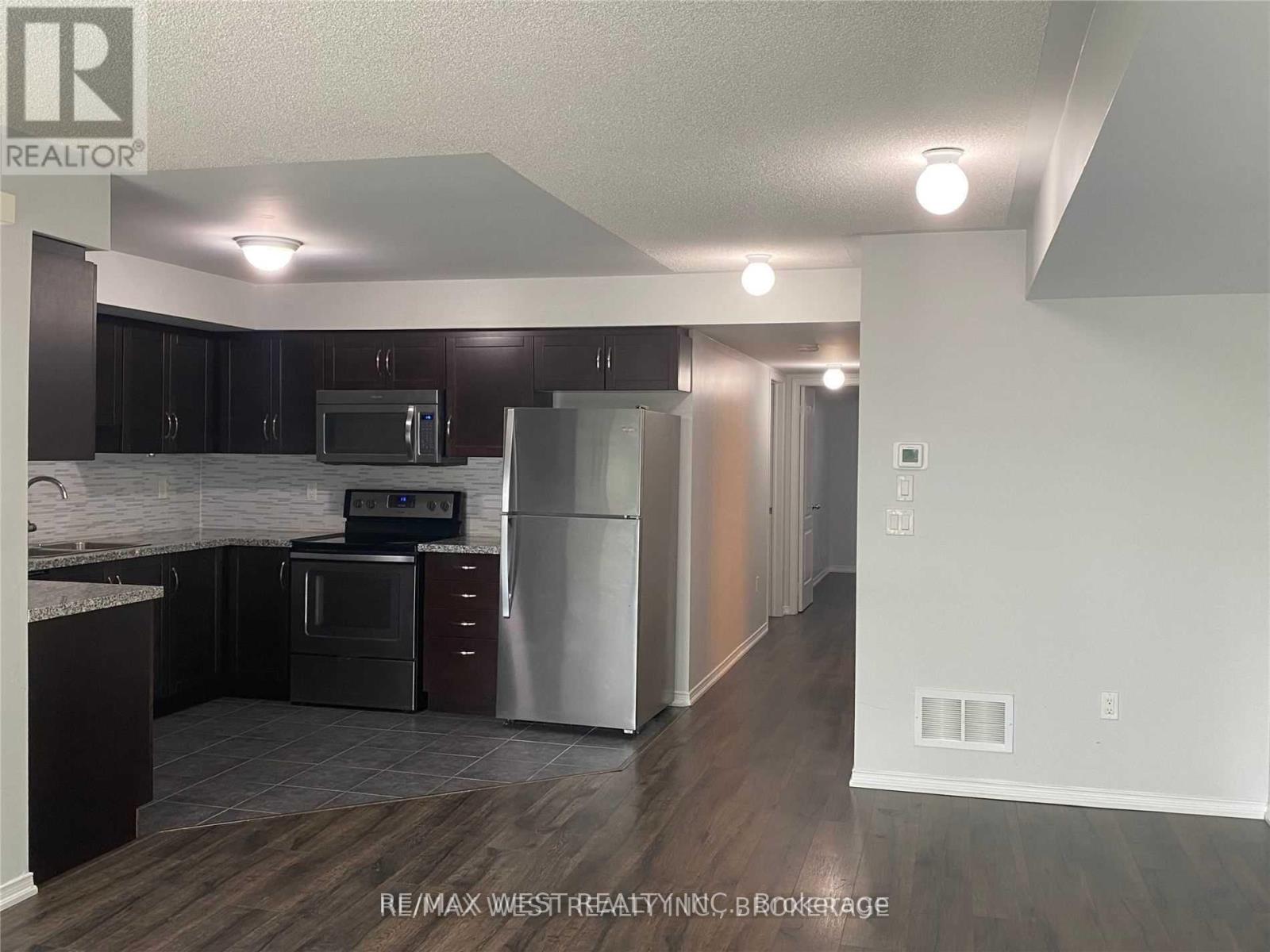 421 - 130 Widdicombe Hill Boulevard, Toronto, Ontario  M9R 4A6 - Photo 7 - W12491792