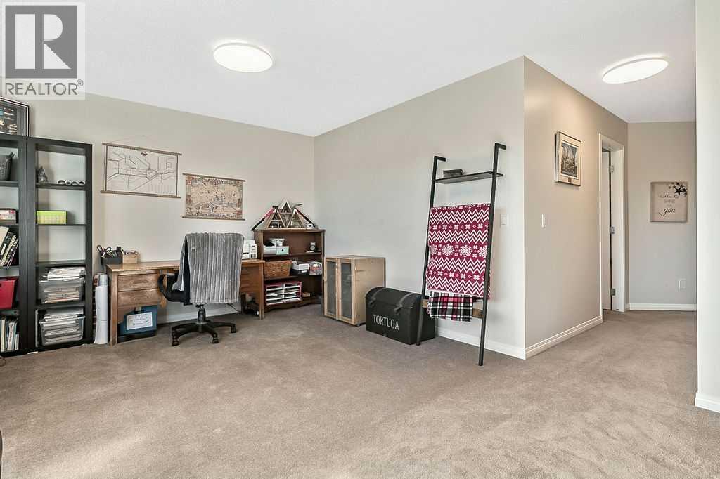 394 Cimarron Boulevard, Okotoks, Alberta  T1S 0A9 - Photo 15 - A2263407